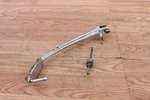 1999 Suzuki VL1500 Kick Stand Side With Return Spring & Pivot Bolt 42310-10F01. Fixed Price $25.00.