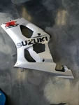 2003-2004 Suzuki Gsxr 1000 Oem Left Fairing 94481-18G Silver. Fixed Price $60.00.