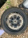 04-09 Suzuki Front Wheel Rim W/ Tire And Rotor. Fixed Price $169.99.